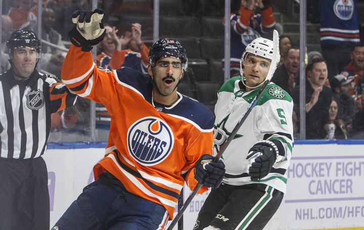Dallas Stars’ Andrej Sekera (5) looks on as Edmonton Oilers’ Jujhar Khaira (16) celebrates a goal during second period NHL action in Edmonton, Alta., on Saturday November 16, 2019.