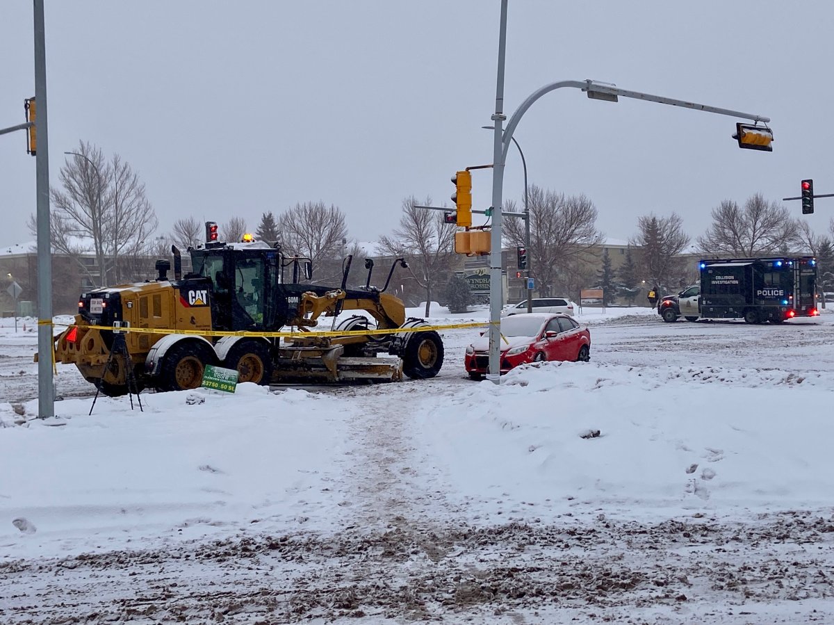 A car and a grader collided near 50 Street and 137 Avenue in north Edmonton on Wednesday, Dec. 22, 2021.