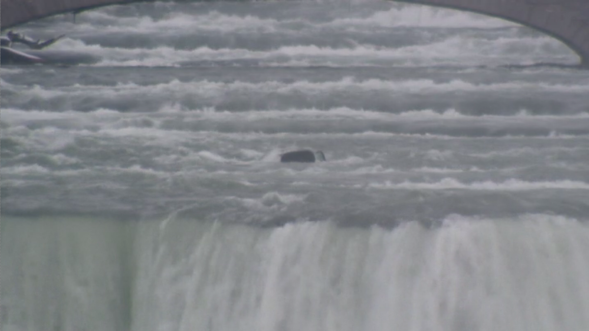 A car that went into the Niagara River on December 8, 2021 went over the Falls days later is now not visible. New York Parks officials say that has hindered removal plans for the time being.