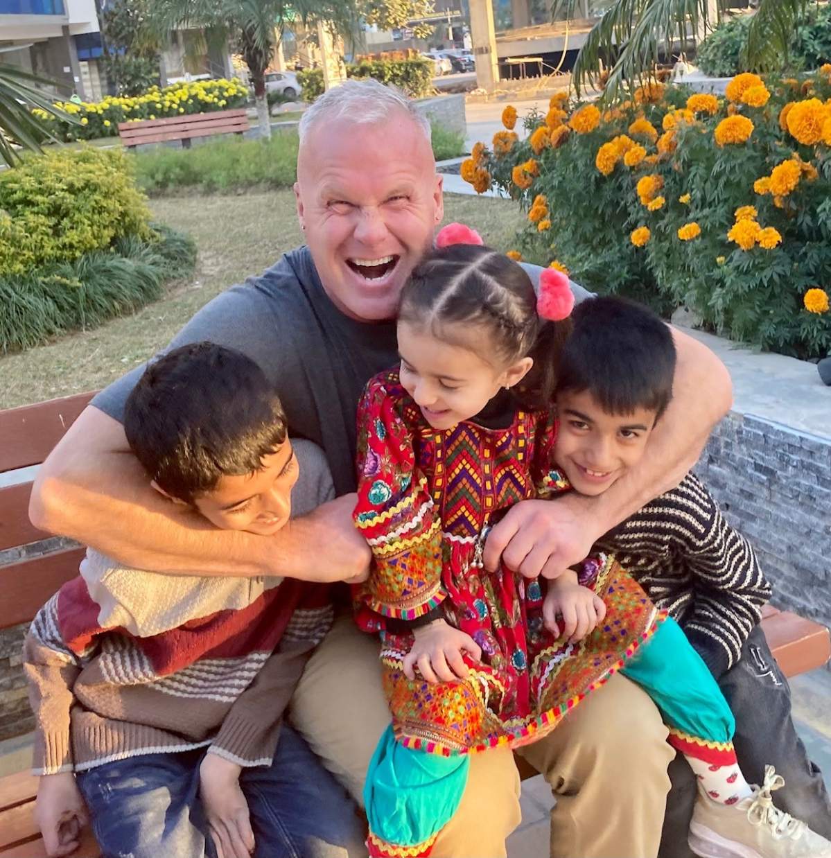 Alberta man Spencer Sekyer with the children of Naveed and Mashala in Pakistan in December 2021.