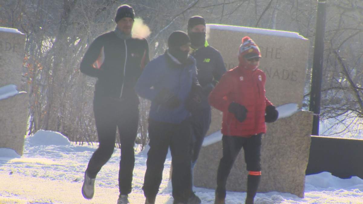 Junel Malapad (right) and his friends begin the 48 hour run to raise funds for Siloam Mission.