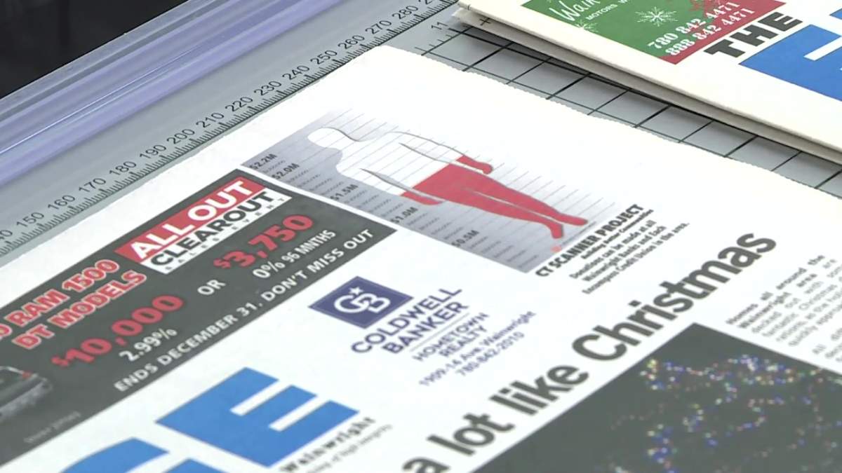 Scanner man on the front of the Wainwright Star newspaper in Wainwright, Alta.