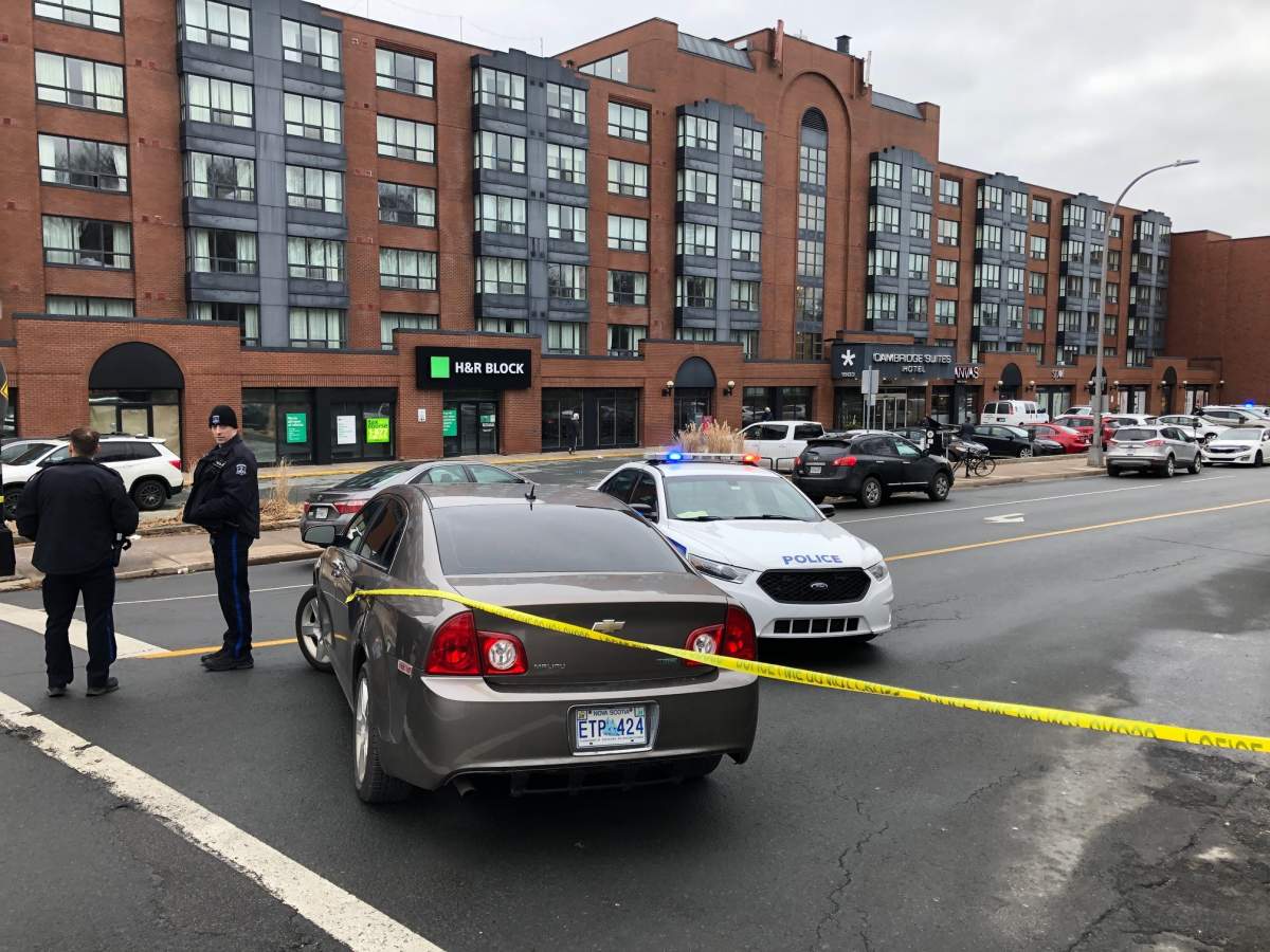 Halifax Regional Police are seen outside of a business on Brunswick Street after a weapons call was reported. 
