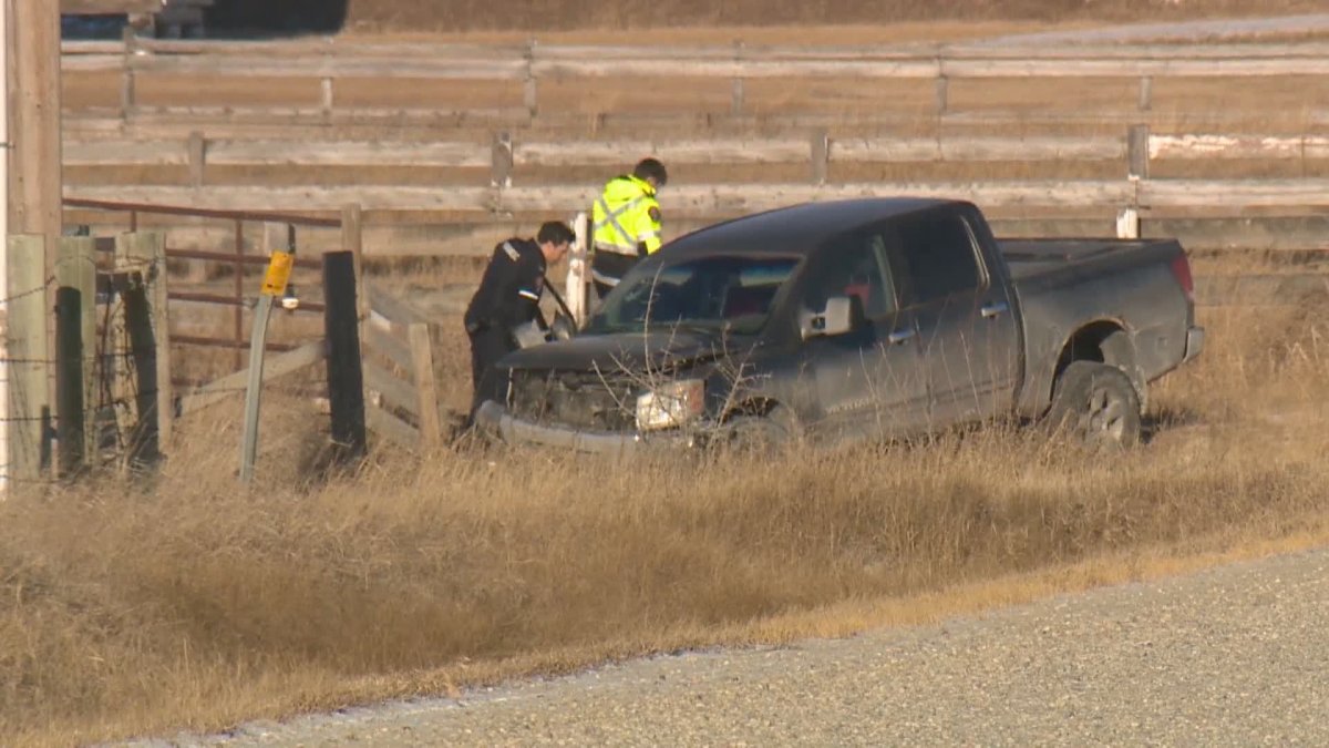 RCMP investigate a single-vehicle crash near Calgary Dec. 11, 2021. 