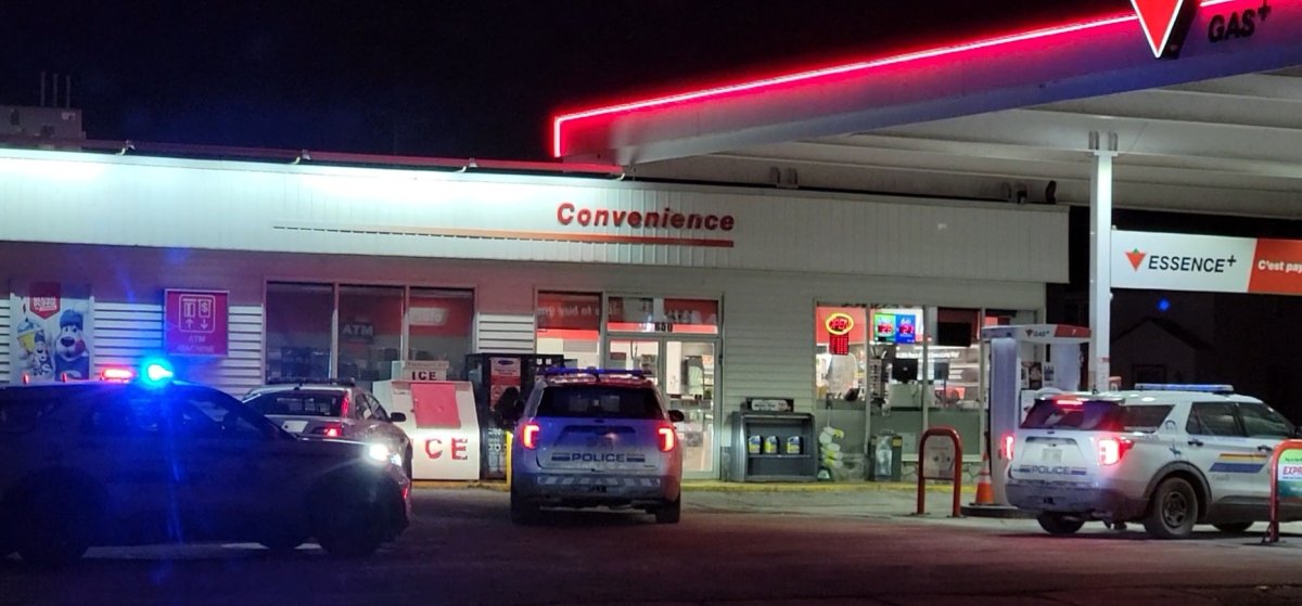 Police investigate after a man entered a store with a firearm Monday night and took money and cigarettes.