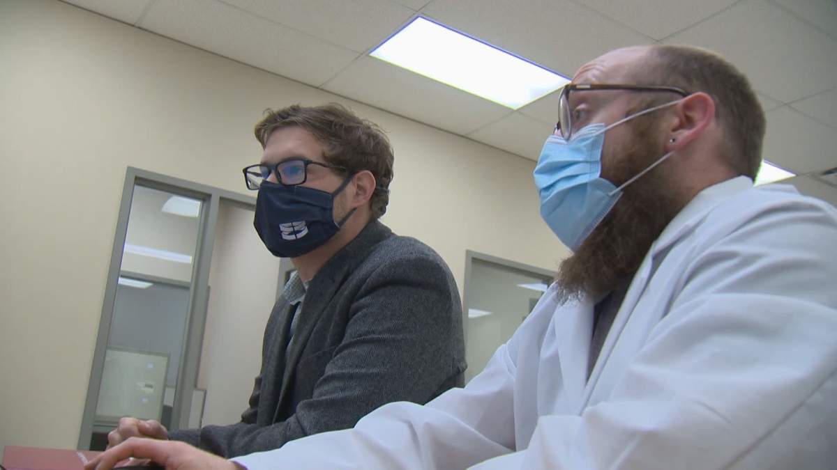 E3 Metals CEO Chris Doornbos looking over the results of the companies lithium extraction technology at the University of Calgary.