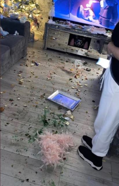 A Grinch-for-hire destroyed Laura Magill's home, including the very nice food spread she had prepared for him. 