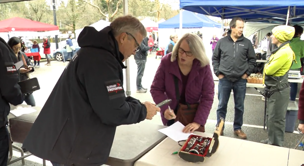 People donate instruments at a previous instrument drive in Burnaby in 2019. 