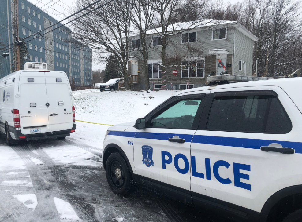 Photo of police in front of the residence on Kennedy Drive in Dartmouth.