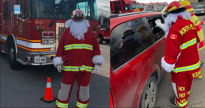 The fire hall Santa and Sparky the Dog greeting Londoners dropping off donations for the 2021 Lights and Sirens Toy Drive.