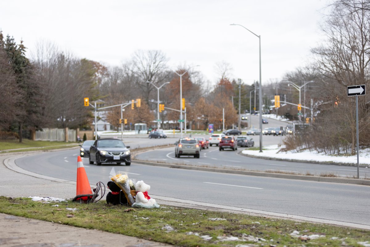 A memorial sits on Riverside Drive near Wonderland Road for victims in London, Ont., on Wednesday, Dec. 1, 2021, following a fatal collision involving pedestrians Tuesday night. 