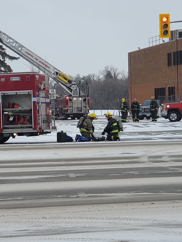 Firefighters attend to a fire at St. James Collegiate Sunday morning.