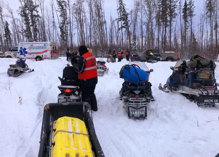 A team comprising of family members, RCMP and Canadian Rangers located a group of snowmobilers who spent the night in -35°C weather overnight after they became stranded.