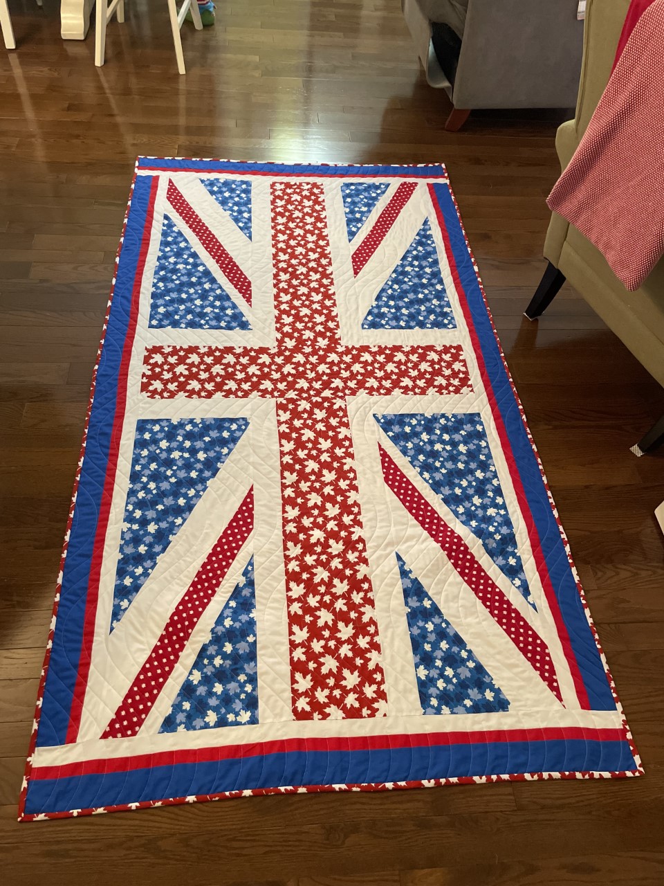 “I saw a picture of a Union Jack quilt on Pinterest and thought it would be a wonderful Christmas gift for my brother. He loves the Union Jack, but is Canadian, so I used maple leaf material, and because he is retired military I used a maple leaf camouflage on the back.” — Ethel Massouh