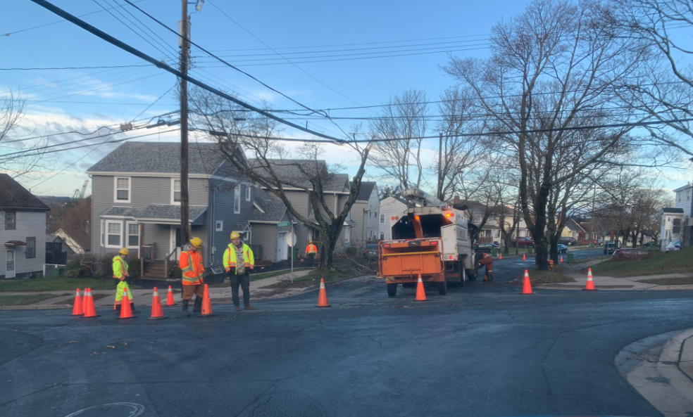 A crew in Halifax is seen clearing up the road from trees that broke after Monday's storm.