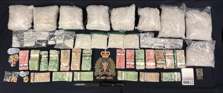 A supplied photo of some of the drugs and money seized as part of the RCMP investigation in New Brunswick. 