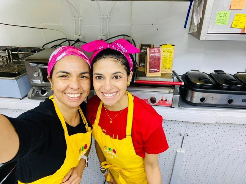 Friends Maria Avilan and Carla Calderon owners of Arepa Ink in London Ont., .