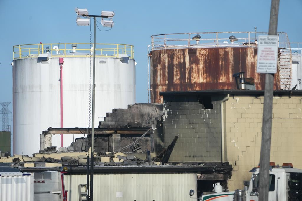 The scene of an industrial explosion in shown in Ottawa, Friday, Jan.14, 2022. Ottawa police say one man has died and five others are missing after an explosion at an Ottawa tanker-truck manufacturer yesterday. THE CANADIAN PRESS/Sean Kilpatrick.