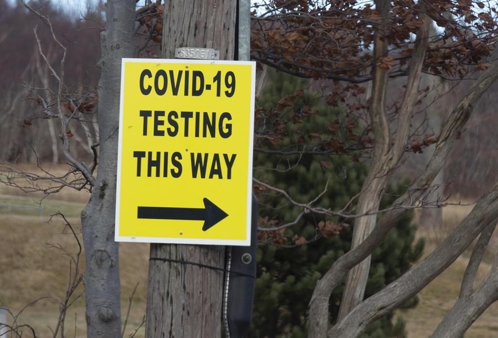 A sign for Eastern Health's main PCR testing site outside the Waterford Hospital in St. John's is shown on Tuesday, January 11, 2022. Testing is by appointment only. The CANADIAN PRESS/Paul Daly.