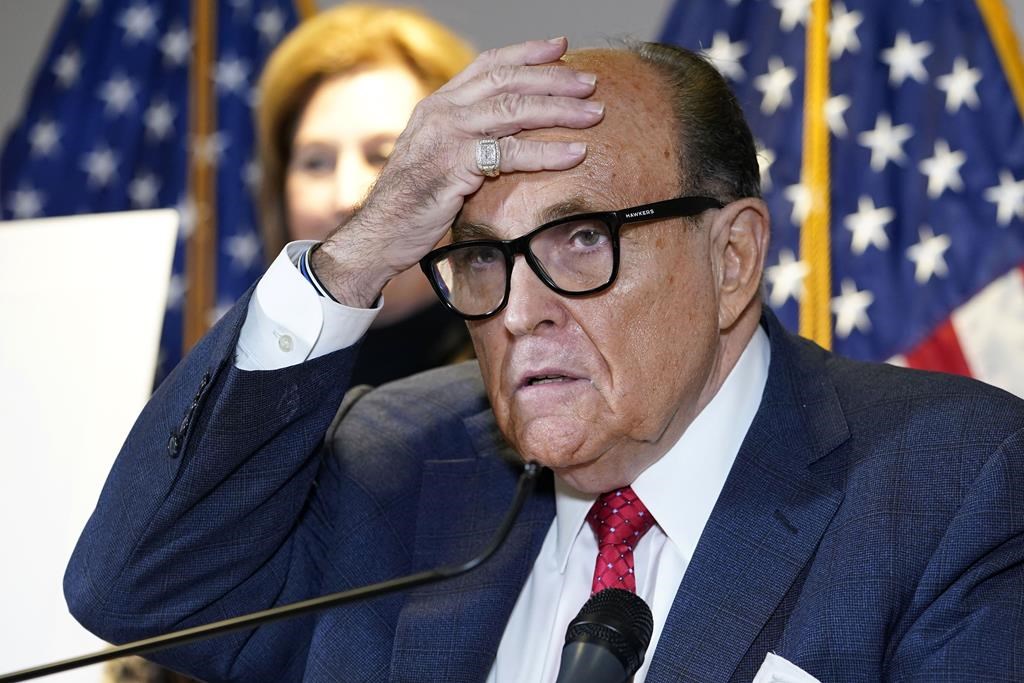 In this Nov. 19, 2020, file photo, former New York Mayor Rudy Giuliani, who was a lawyer for President Donald Trump, speaks during a news conference at the Republican National Committee headquarters in Washington.