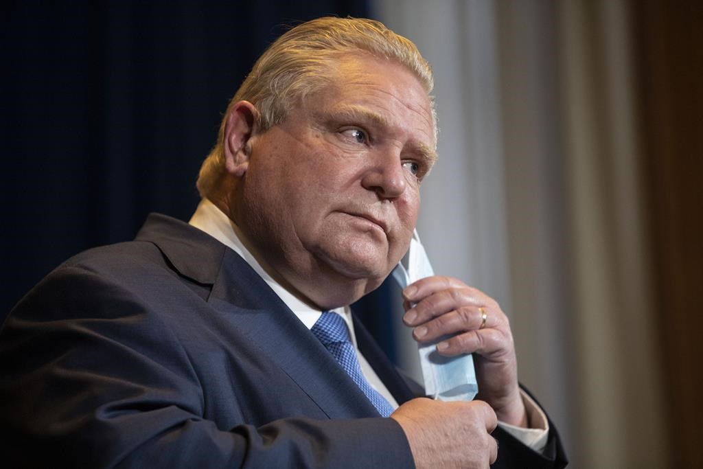 Ontario Premier Doug Ford attends a news conference in Toronto on Monday, Jan. 3, 2022. 