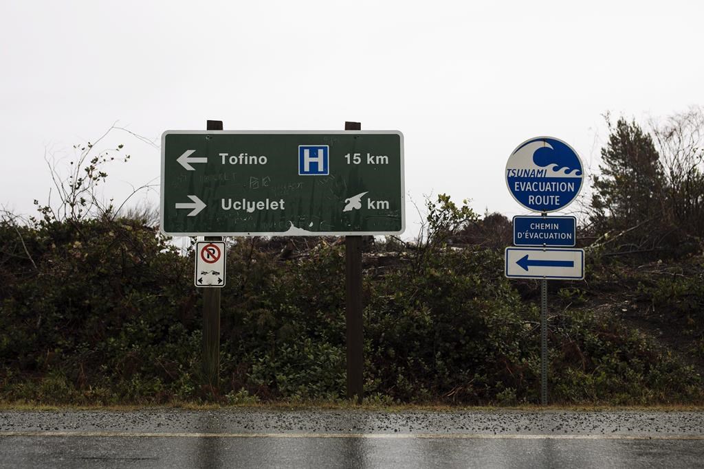 Signs are posted along the Pacific Rim Highway in between Tofino and Ucluelet, on Tuesday, Jan. 23, 2018. 