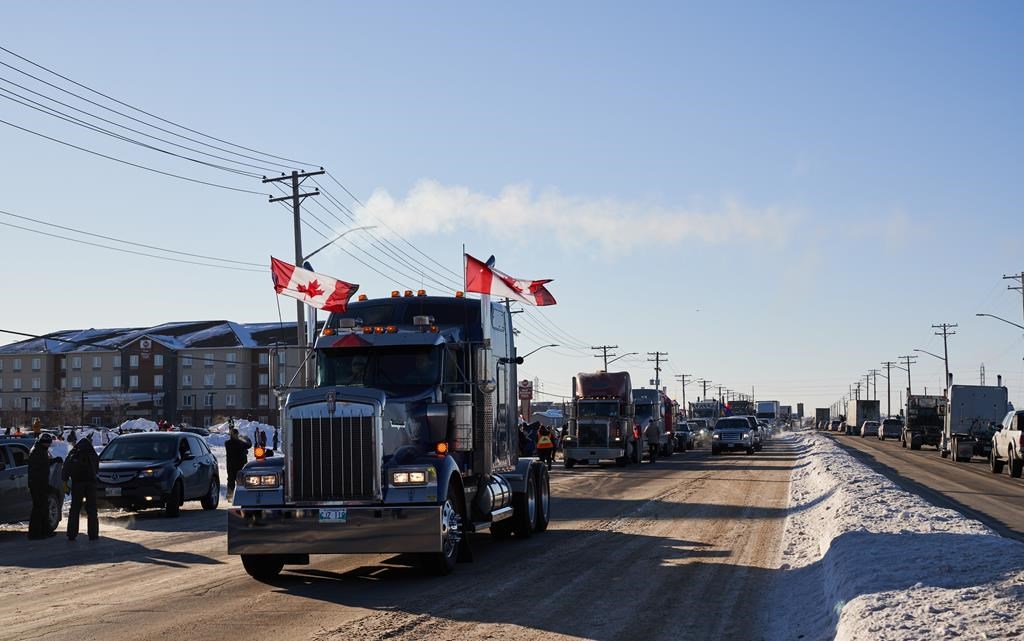 Quebec truckers join up with convoy en route to Ottawa to protest vaccine mandates