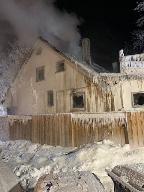A wall was at immediate risk of failing from its loss of structural strength as fire consumed structural components combined with the weight of water freezing to the structure. .