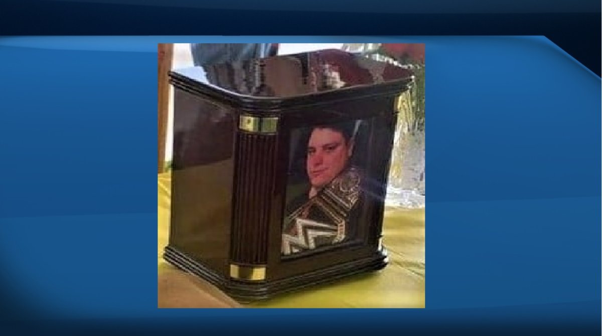 A Facebook post today from the RCMP shows a photo of the stolen urn, an ornate box that features a photo of the young man.