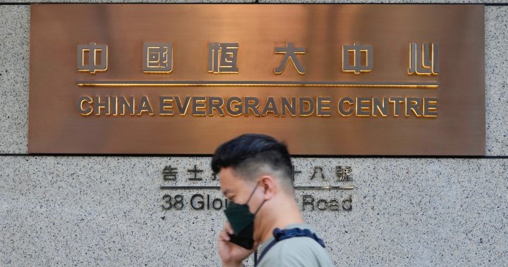 ‘Evergrande, return our money!’: Investors rally outside cash-strapped Chinese firm