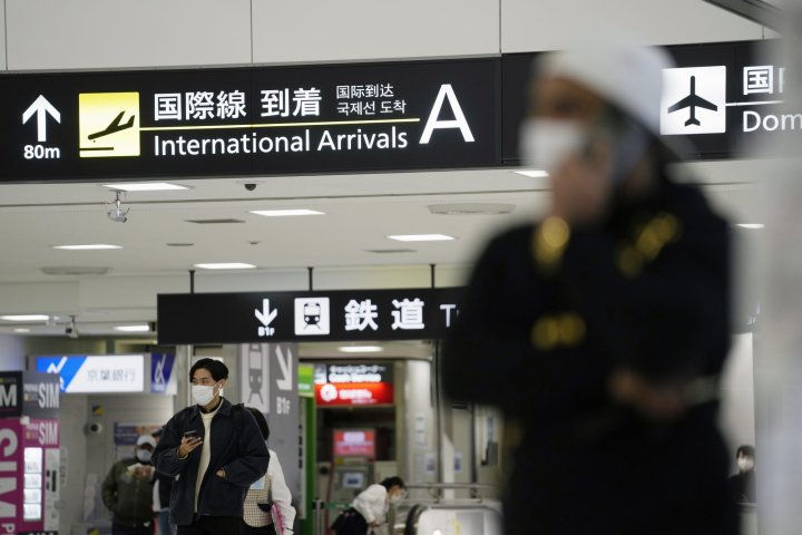 Japan to keep strict border measures until end of February amid Omicron spread