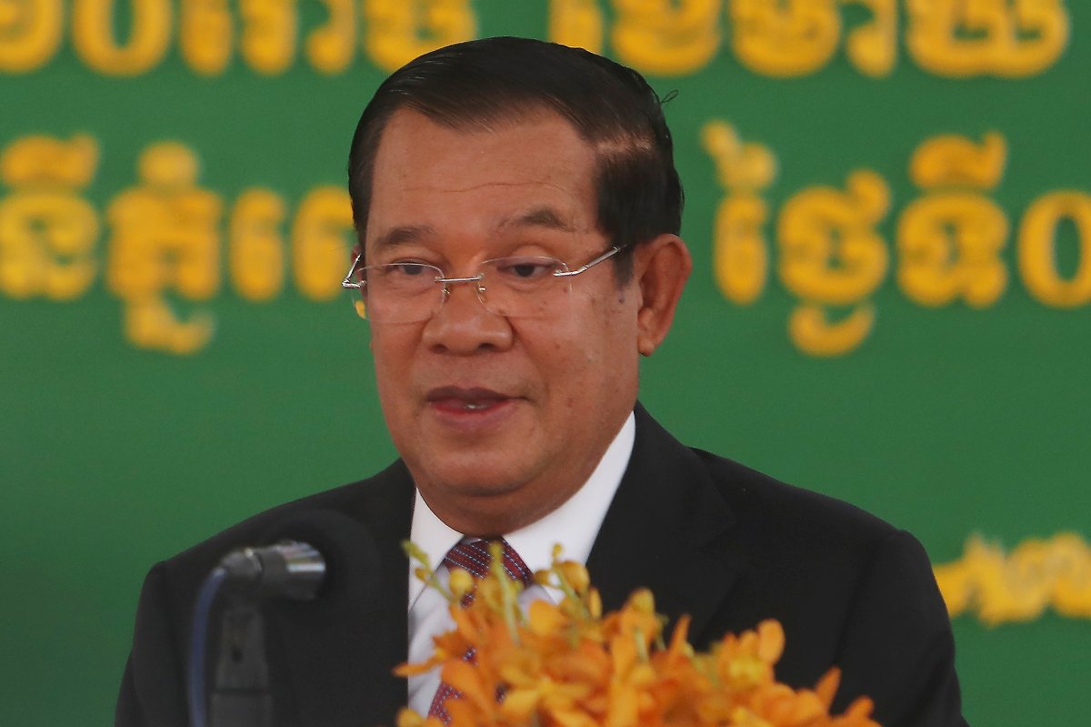 FILE - Cambodian Prime Minister Hun Sen delivers a speech during a handover ceremony at Phnom Penh International Airport, in Phnom Penh, Cambodia on Feb. 7, 2021. Hun Sen begins a visit to strife-torn Myanmar on Friday, Jan. 7,  that he hopes will invigorate efforts by Southeast Asian nations to start a peace process, but critics say will legitimize the rule of the military that took power last year and its campaign of violence. (AP Photo/Heng Sinith, File).