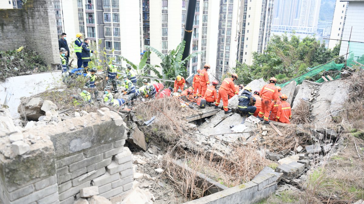 CHONGQING, Jan. 7, 2022  Rescuers search for trapped people at the site of a blast in Wulong District, southwest China's Chongqing, Jan. 7, 2022.
