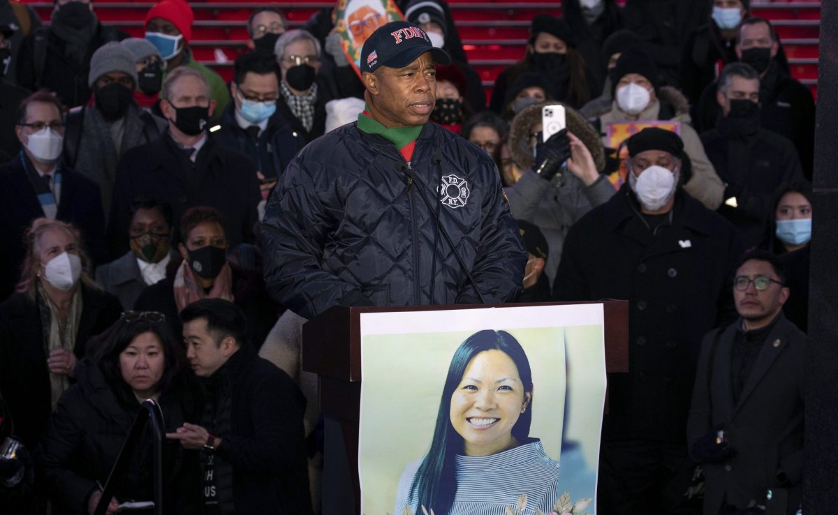 New York City Mayor Eric Adams speaks during a candlelight vigil in honor of Michelle Alyssa Go, a victim of recent subway attack, at Times Square on Tuesday, Jan. 18, 2022, in New York. (AP Photo/Yuki Iwamura).