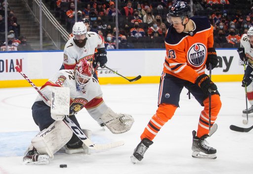 Florida Panthers’ Sergei Bobrovsky (72) makes the save on Edmonton Oilers’ Jesse Puljujarvi (13) during second period NHL action in Edmonton on Thursday, January 20, 2022.THE CANADIAN PRESS/Jason Franson