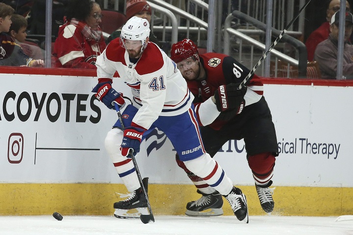 In this 2019 photo, Montreal Canadiens left wing Paul Byron (41) skates with the puck in front of Arizona Coyotes center Phil Kessel (81) during the second period of an NHL hockey game in Glendale, Ariz. Ross D. Franklin/AP Photo The Canadian Press.