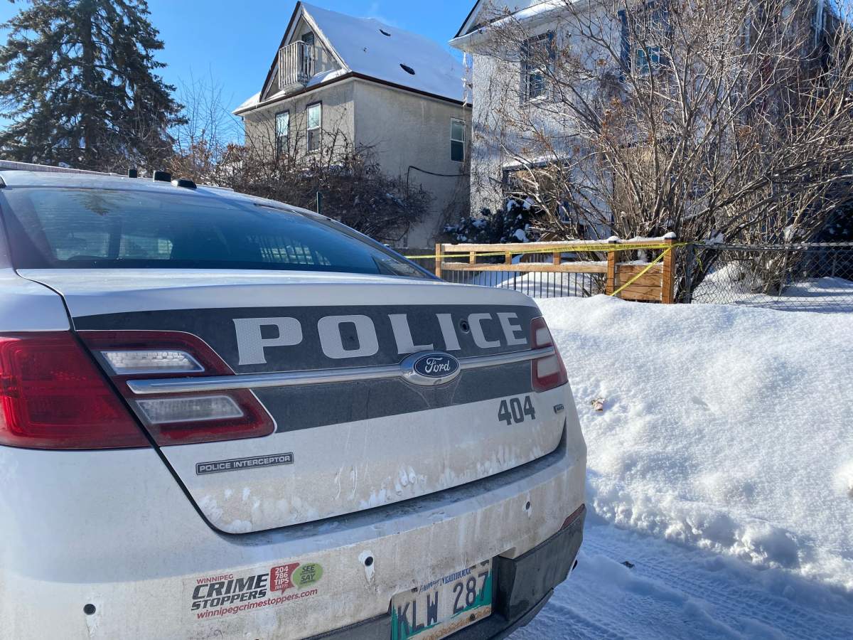 Winnipeg police at the scene of the Young Street shooting.