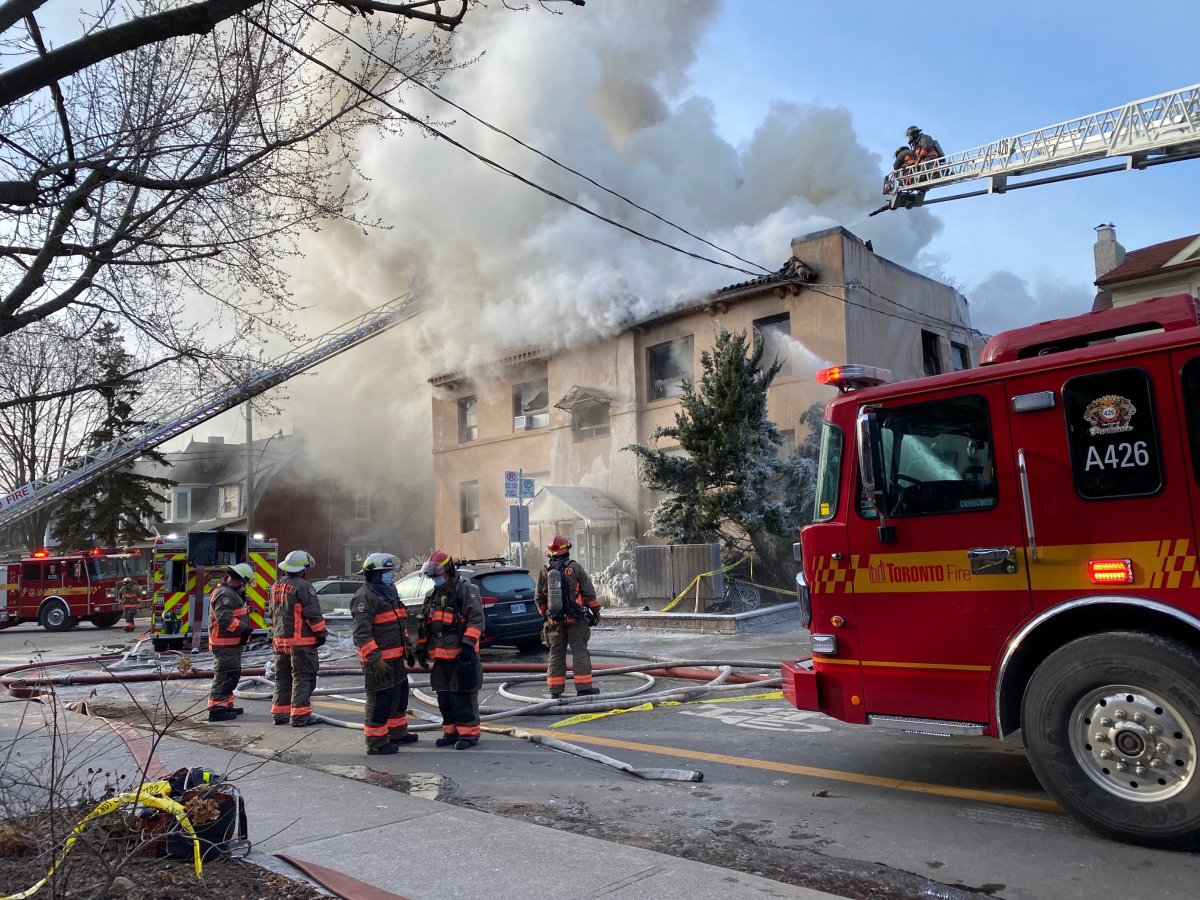 Fire crews responding to a four alarm fire at an apartment building in Toronto's west end. 