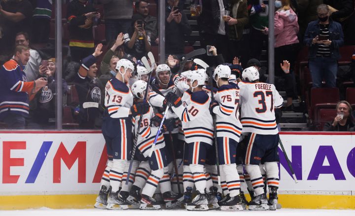 Edmonton Oilers rally for OT win in Vancouver