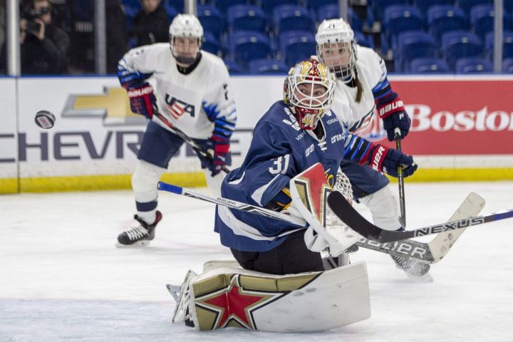 Finland goaltender Noora Raty looks back as a shot from the United States goes wide during the third period of the 2018 Four Nations Cup opening game in Saskatoon, Tuesday, November 6, 2018. The United States defeat Finland 5-1.