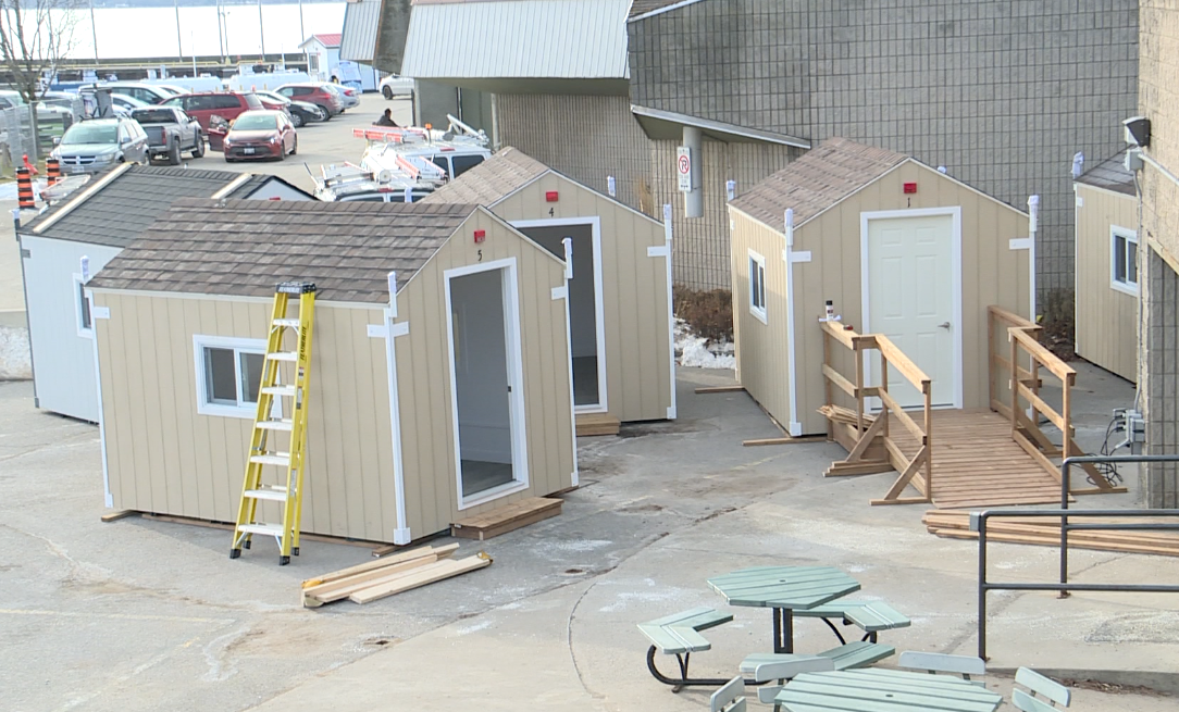 Sleep cabins for Kingston's unhoused have been set up at Portsmouth Olympic Harbour. 