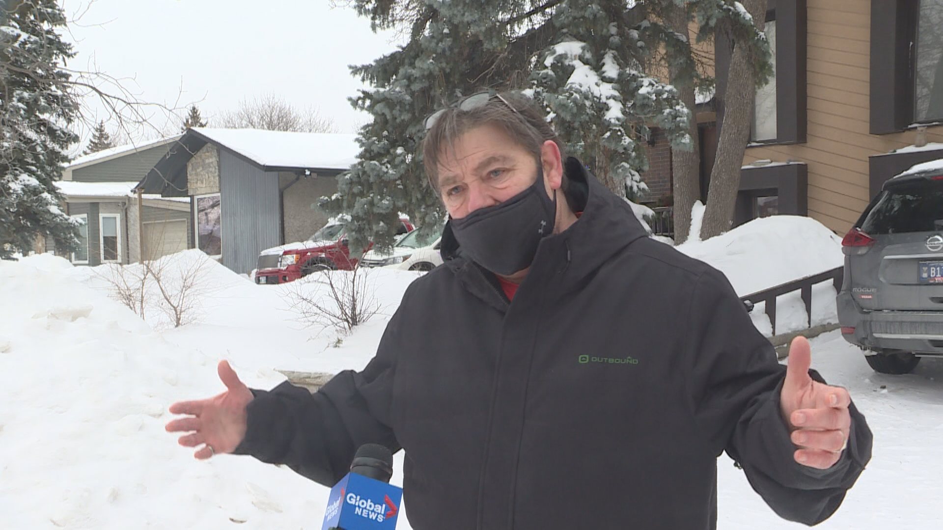 Ed Buell says it was “difficult” dealing with Winnipeg’s 311 service as he sought to have a snow pile removed from the end of his driveway.