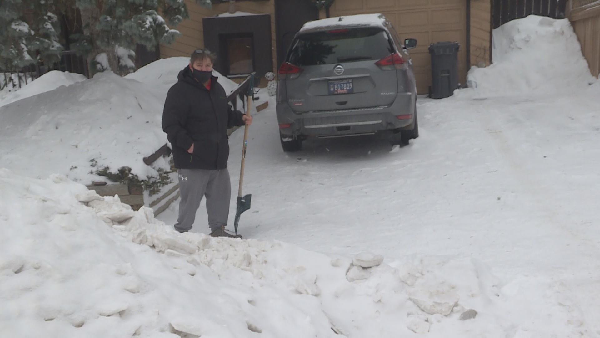 Ed Buell says it was “difficult” dealing with Winnipeg’s 311 service as he sought to have a snow pile removed from the end of his driveway.