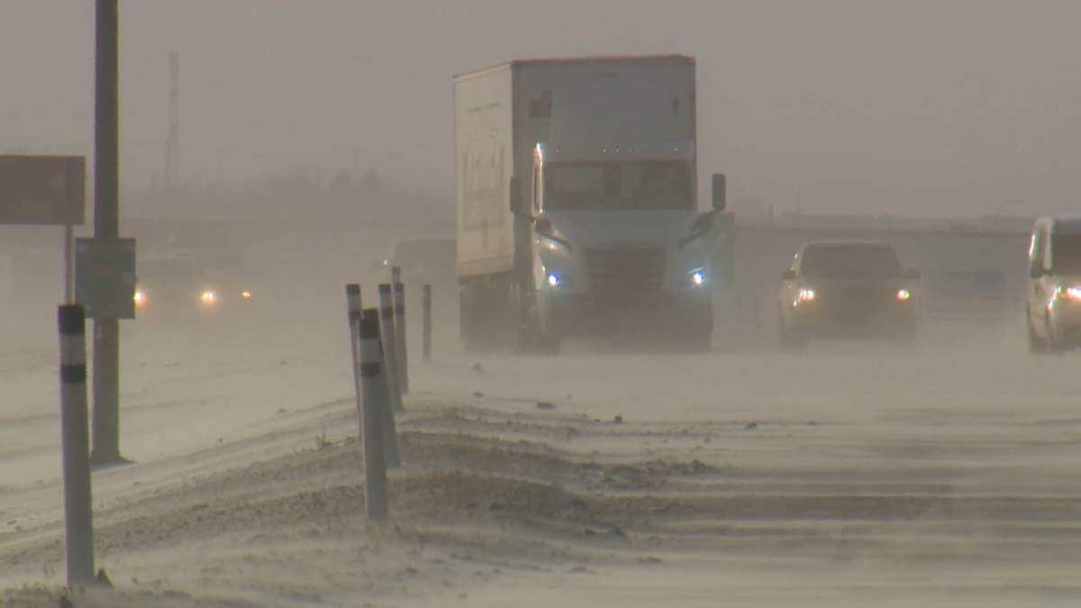 travel snow QE2 Highway winter roads semi 2