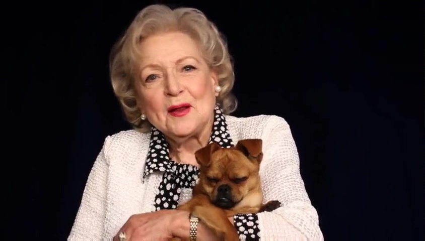 Betty White in a PSA for the Pedigree Adoption Foundation with Yogi, a California Canine Cuties dog adopted from the Edmonton Humane Society.