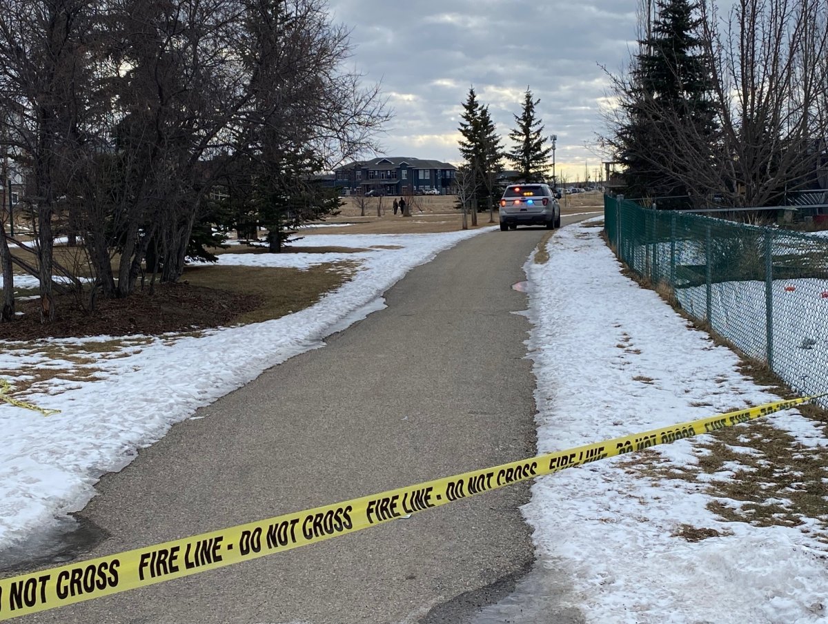 Airdrie RCMP investigate in the Willowbrook neighbourhood near the pathway along Nose Creek Wednesday, Jan. 26, 2022.