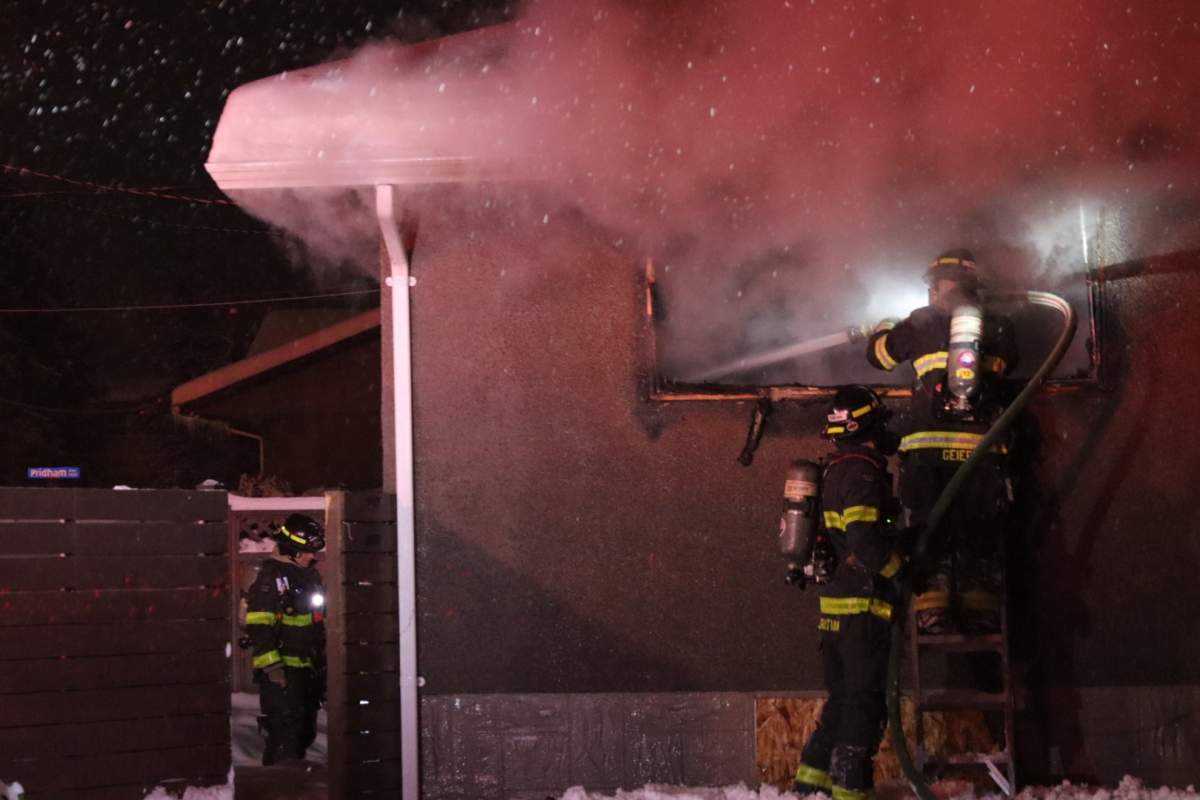 The Kelowna Fire Department battled back flames at this boarded up home on Chandler Street.
