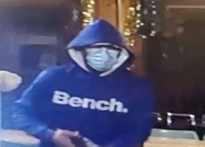 Police say the suspect is described as about six feet tall with a stocky build. He was wearing a blue hooded sweater, blue jeans and black shoes.