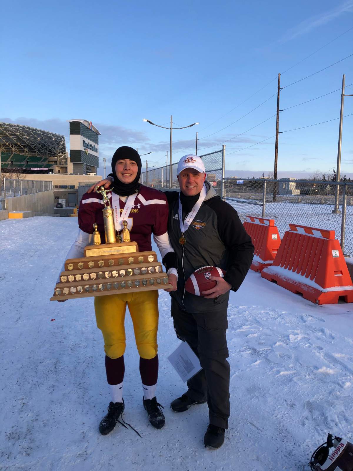 John Foord celebrates a provincial championship win in 2019 with his son Jack.