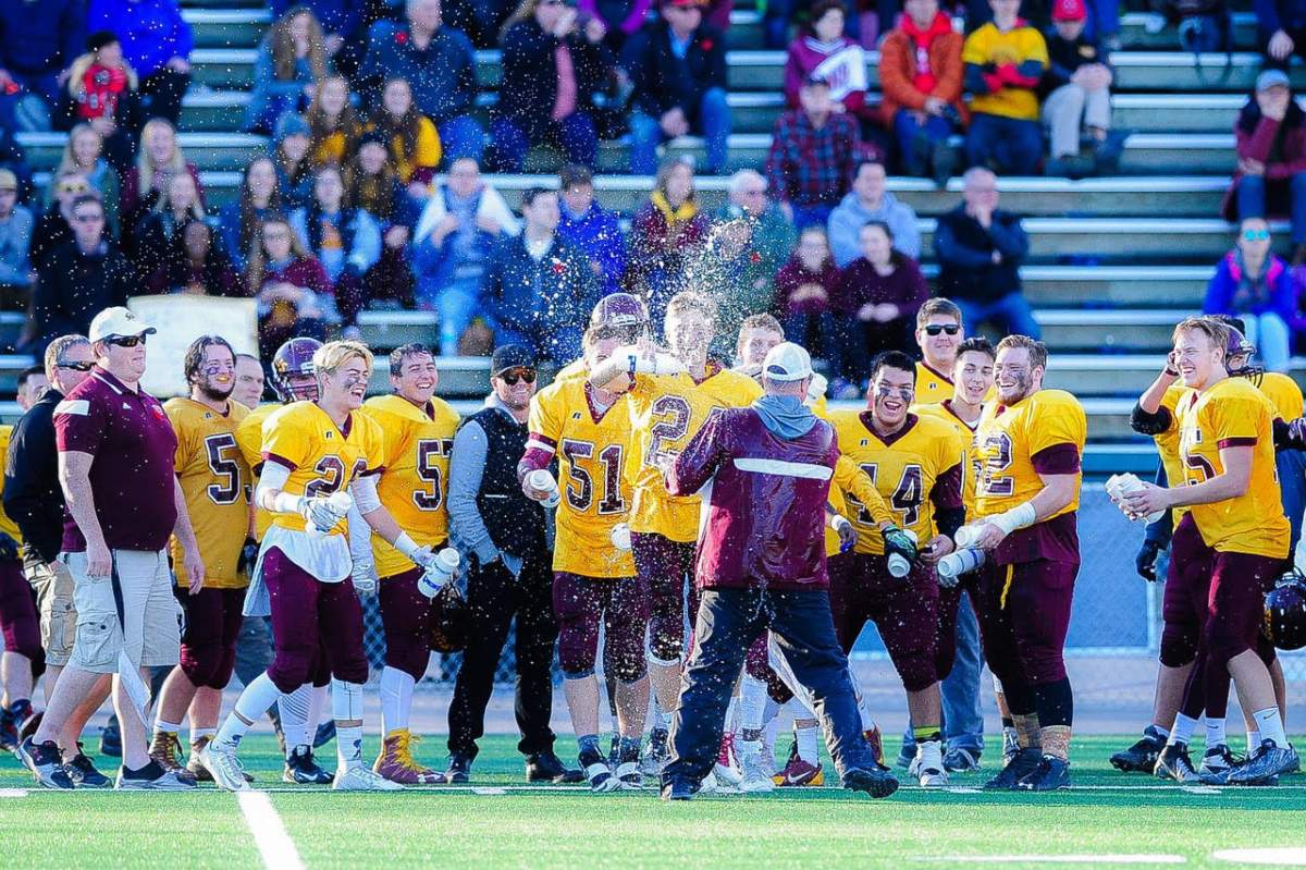 Foord and LeBoldus players celebrate a 2015 provincial championship win in Saskatoon.